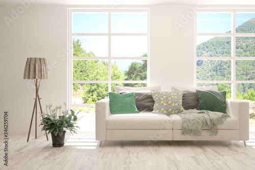Wallpaper Mural White living room with sofa and summer landscape in window. Scandinavian interior design. 3D illustration Torontodigital.ca