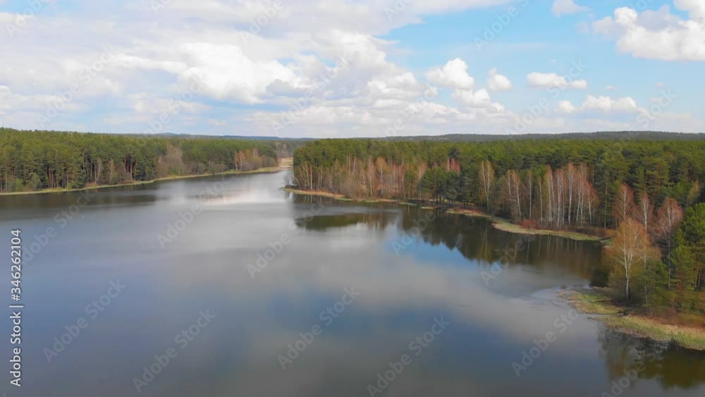 Flying above the lake and forest. Drone aerial footage Flying above the lake and forest. Drone aerial footage