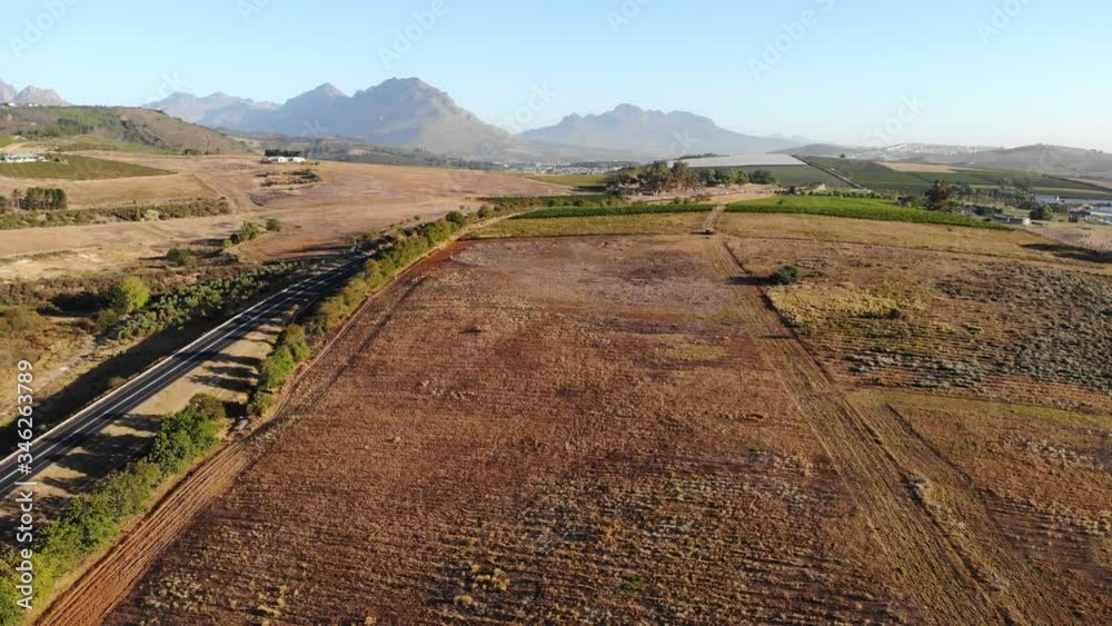 Aerial over dry farm field in Stellenbosch South Africa Aerial over dry farm field in Stellenbosch South Africa