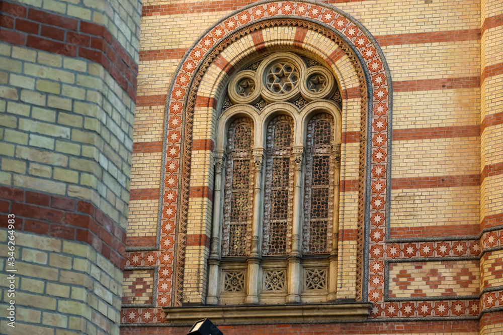 A decorative stained-glass window at the Dohany Street Synagogue, Budapest, Hungary.
