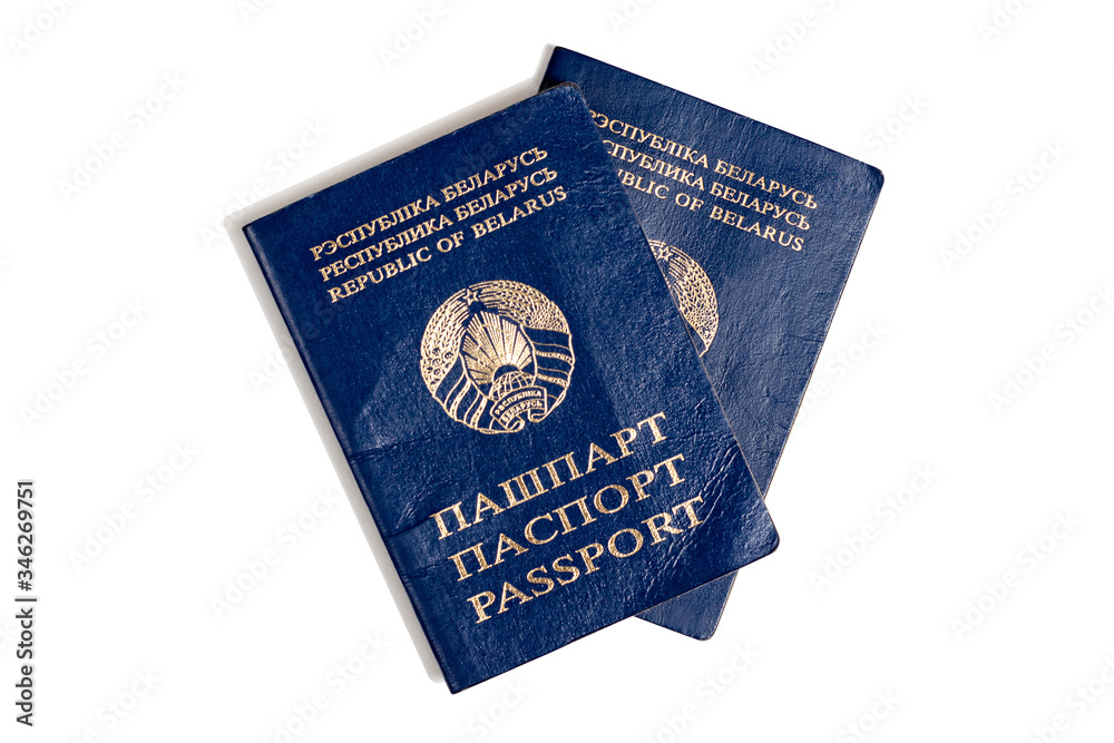 2 old rumpled passports of a citizen of the Republic of Belarus. Isolated on white 2 old rumpled passports of a citizen of the Republic of Belarus. Isolated on white