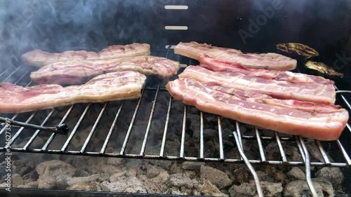 cooking meat on the bbq photo