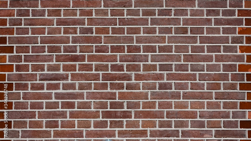 Abstract brick wall background, closeup. Red brick wall texture.