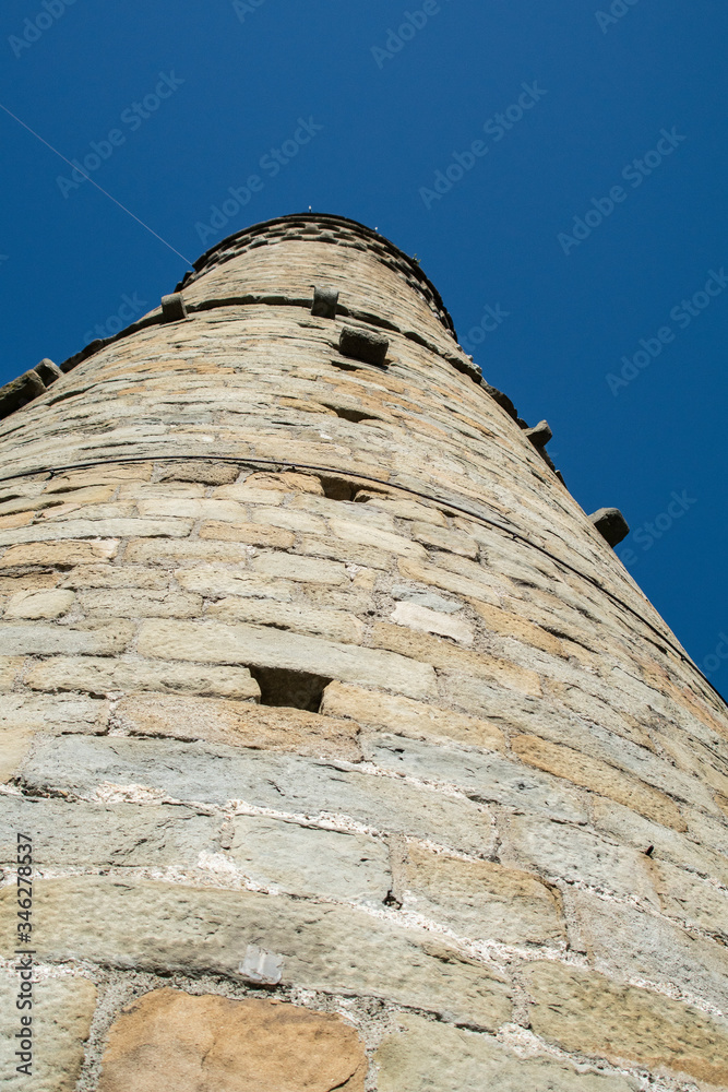 old tower on blue sky