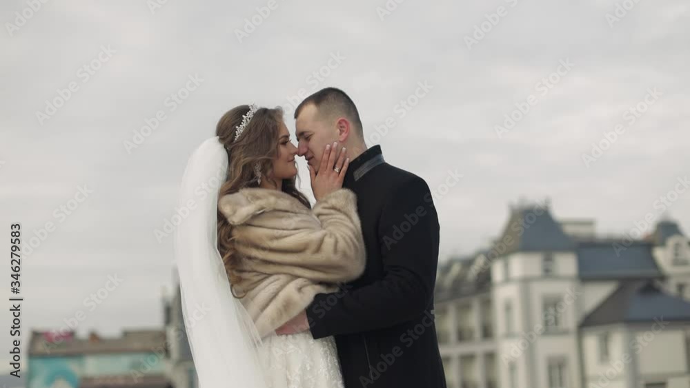 Newlyweds. Caucasian groom with bride stay together. Wedding couple. Happy Newlyweds. Caucasian groom with bride stay together. Wedding couple. Happy