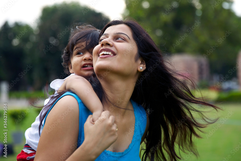 Mother and the little kid having fun together. Mother and child concept! Mother and the little kid having fun together. Mother and child concept!