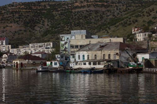 Sevastopol city, Balaklava district view of the houses from the bay. © Irida