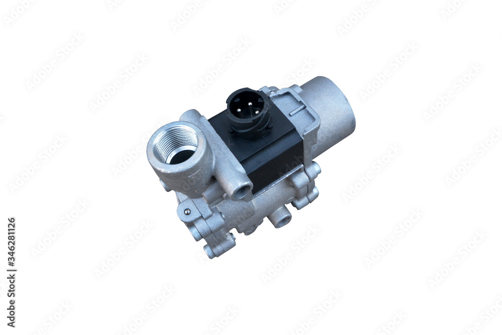 ABS modulator of the brake system with a magnetic valve for a truck isolated on white background. Spare parts. System security braking of the vehicle.