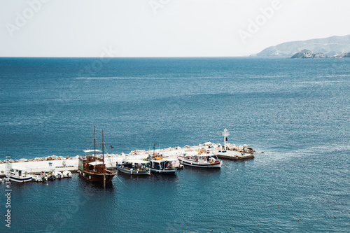 pier with boats on the sea