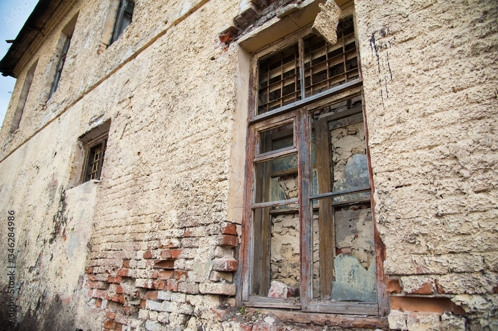 Facade of the old dilapidated house