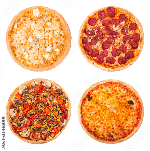 Set of four tasty pizza, isolated on a white background, top view. Quattro formaggi, salami pizza with mushrooms, Vegetarian pizza and Margherita