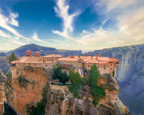 The monastery in the rock is at Meteora Greece the water and the time gave that shape to the rocks and made them one of the most famous attractions in the world