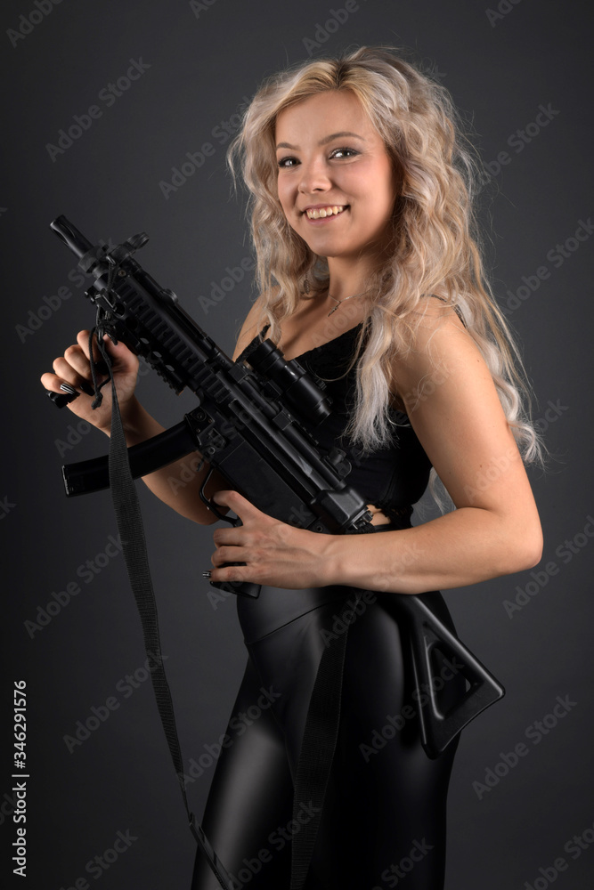 beautiful sexy girl holding gun 