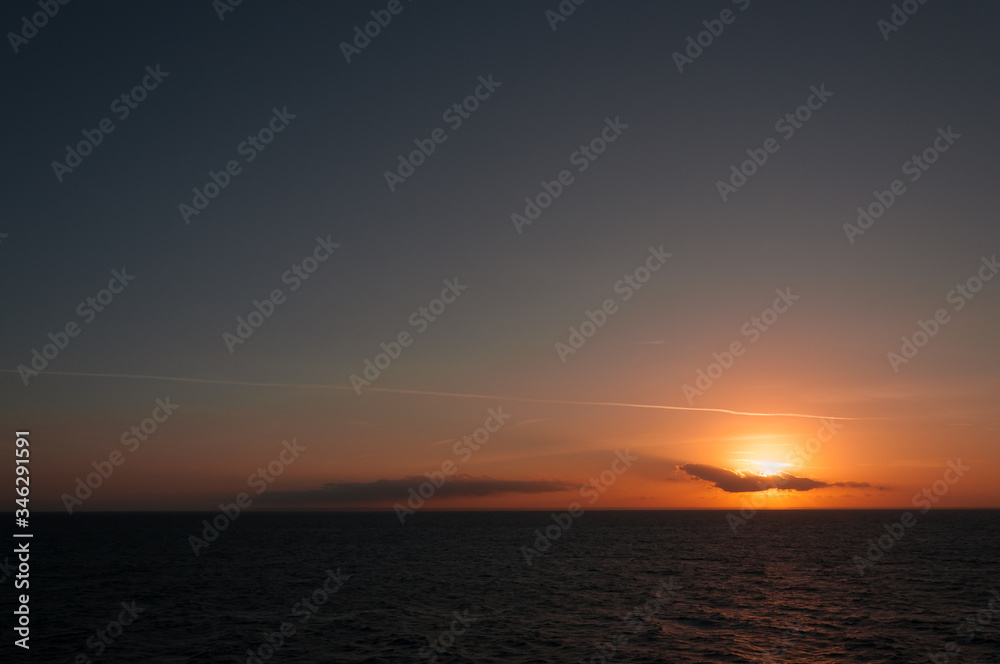 Wonderful colorful sky with clouds during sunset on the Adriatic coast, Puglia, Italy. Concept: spectacular panorama, tranquility, serenity, inspiration Wonderful colorful sky with clouds during sunset on the Adriatic coast, Puglia, Italy. Concept: spectacular panorama, tranquility, serenity, inspiration