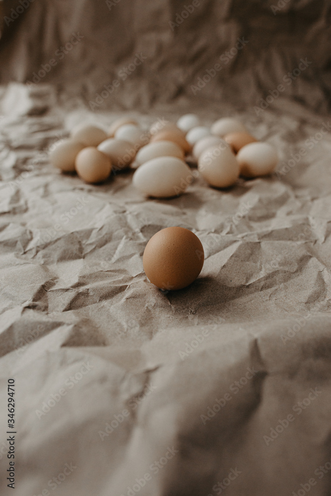 Many dirty eggs on craft paper background Many dirty eggs on craft paper background