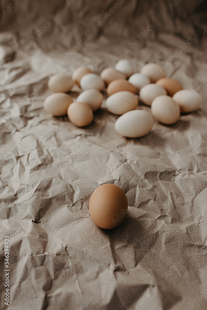 Many dirty eggs on craft paper background Many dirty eggs on craft paper background