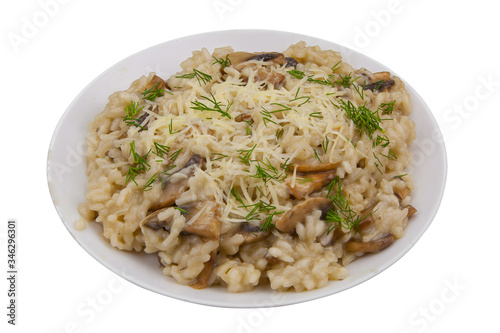 Tasty appetizing risotto on  white plate on  White background