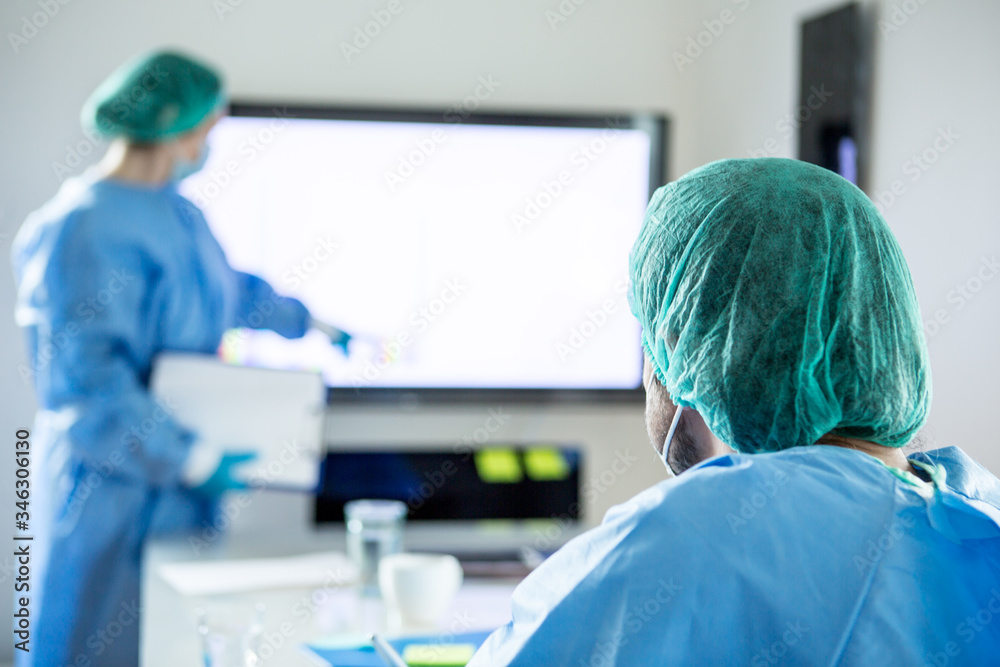 Doctors having a meeting at the hospital. Doctors having a meeting at the hospital.