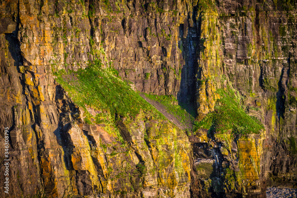Amazing Cliffs of Moher at sunset in Ireland, County Clare. Amazing Cliffs of Moher at sunset in Ireland, County Clare.
