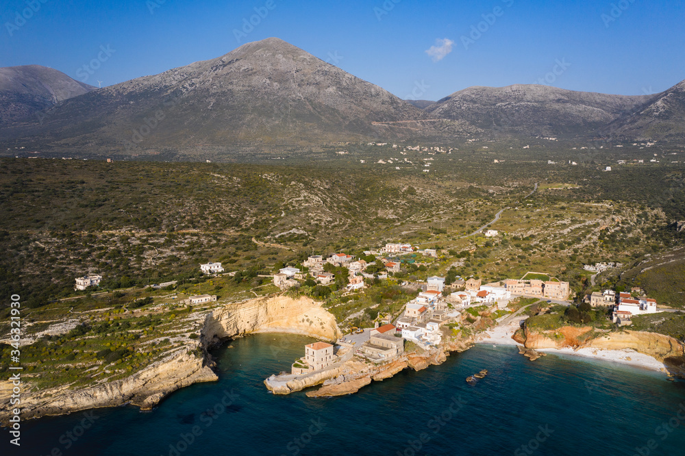 Obraz premium Aerial birds eye view photo taken by drone of fishing village of Mezapos with blue clear waters, Mani, Laconia, Peloponnese, Greece