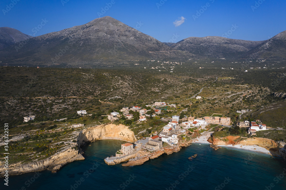 Aerial birds eye view photo taken by drone of fishing village of Mezapos with blue clear waters, Mani, Laconia, Peloponnese, Greece