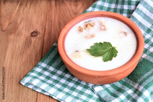 bowl of cream soup with fresh vegetables