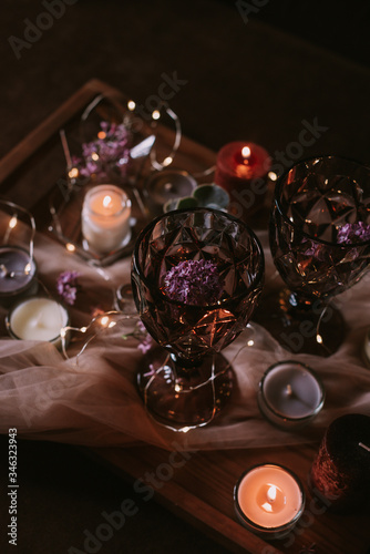 Still life of wedding decorations, candles and wine