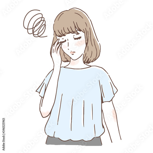 頭痛に悩む女性
