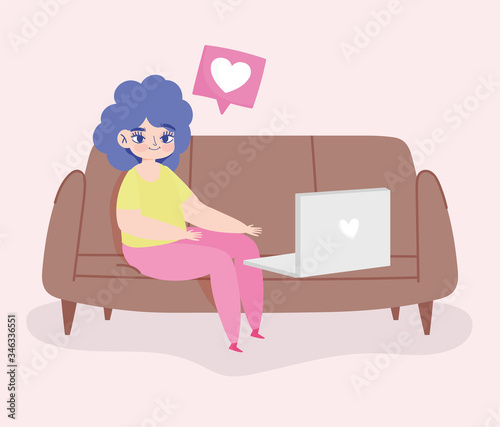 working remotely, young woman sitting on sofa with laptop chatting love