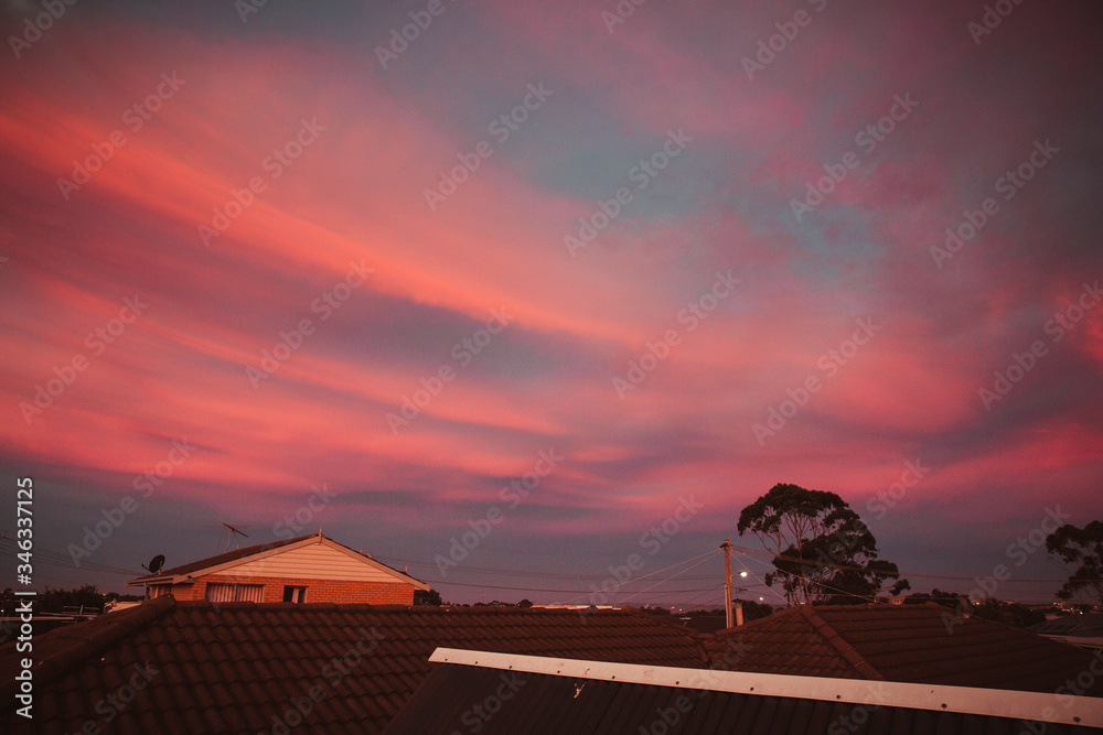 Beautiful Red Sunset Sky Over Town Houses