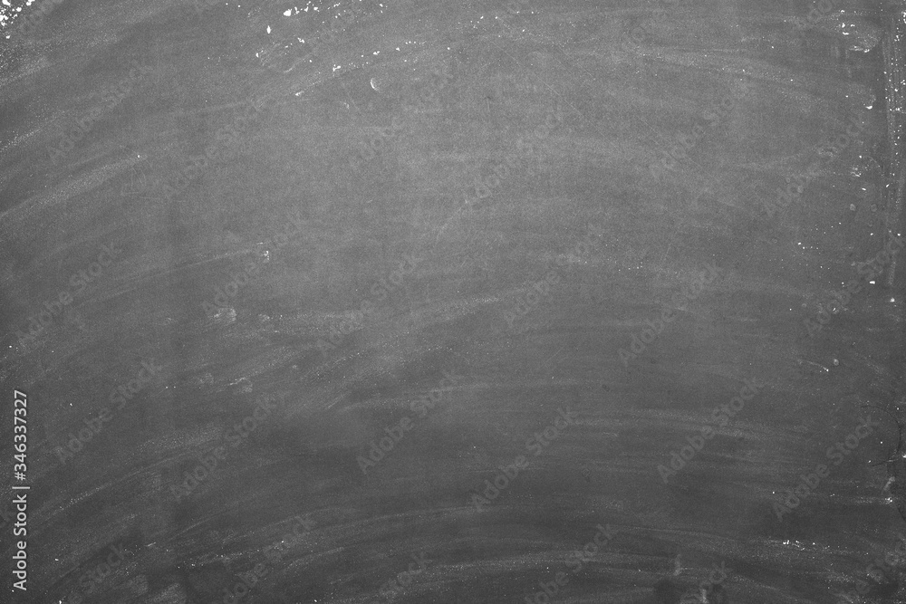 Fototapeta premium sprinkle wheat flour with copy space for text on dark black wood background, top view for cooking dough or pastry background.