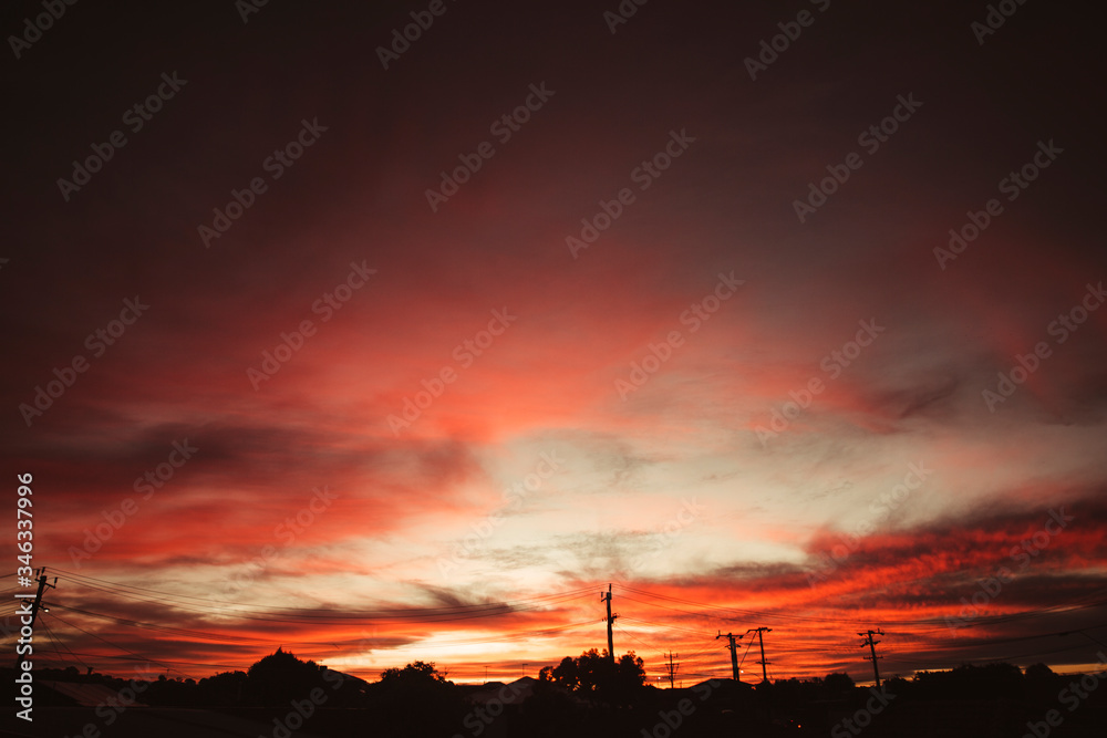Beautiful Red Sunset Sky Over Town Houses