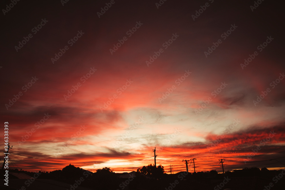 Beautiful Red Sunset Sky Over Town Houses