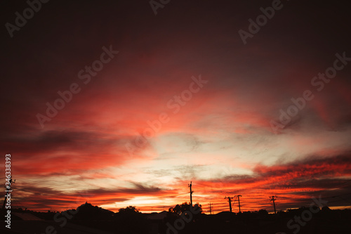 Beautiful Red Sunset Sky Over Town Houses