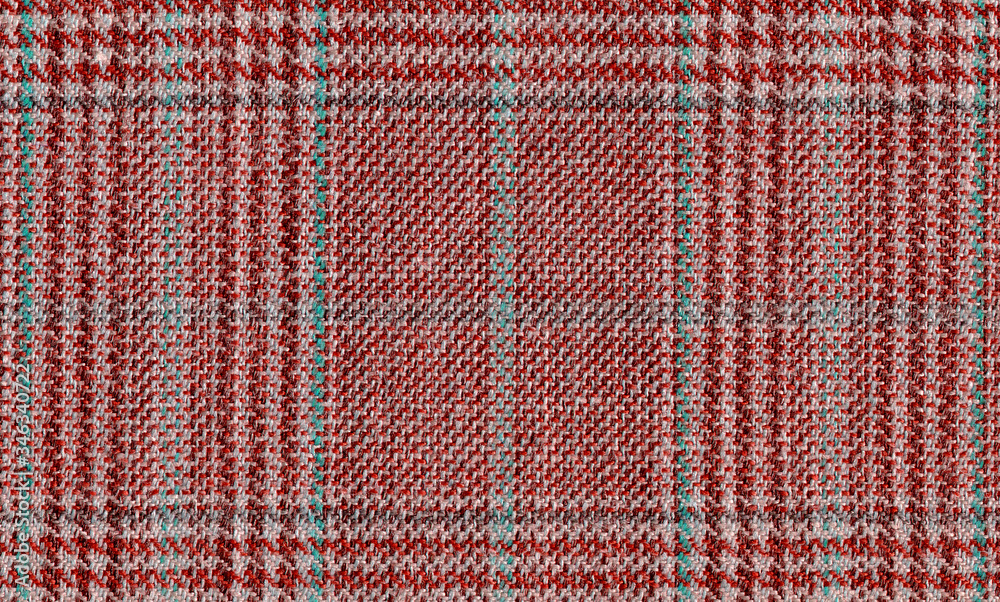 Glenurquhart check is made of red, brown woolen fabric. Tweed, Wool Background Texture. Coat close-up. Expensive men's suit. High resolution