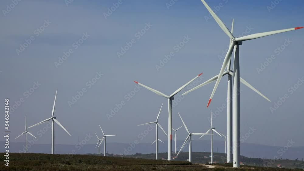 Lots of windmills or wind turbine on wind farm in rotation to generate electricity energy, 4k Lots of windmills or wind turbine on wind farm in rotation to generate electricity energy, 4k