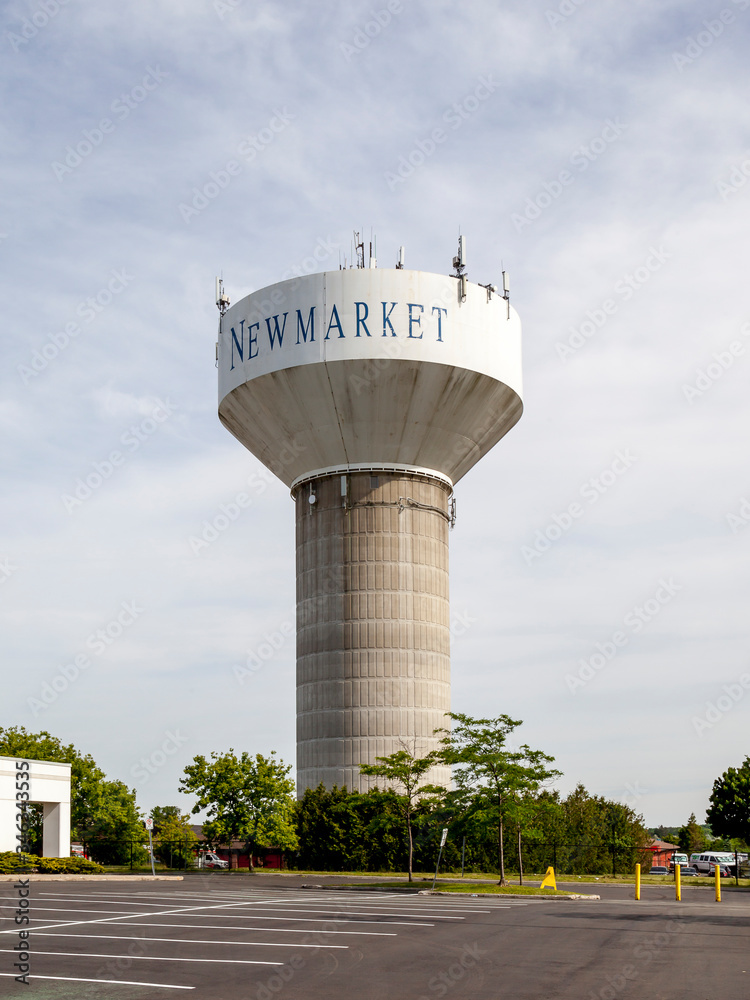 New Market, Ontario, Canada - June 10, 2018: City of New Market Water Tower. Newmarket  a town and regional seat of the Regional Municipality of York in the Canadian province of Ontario. 