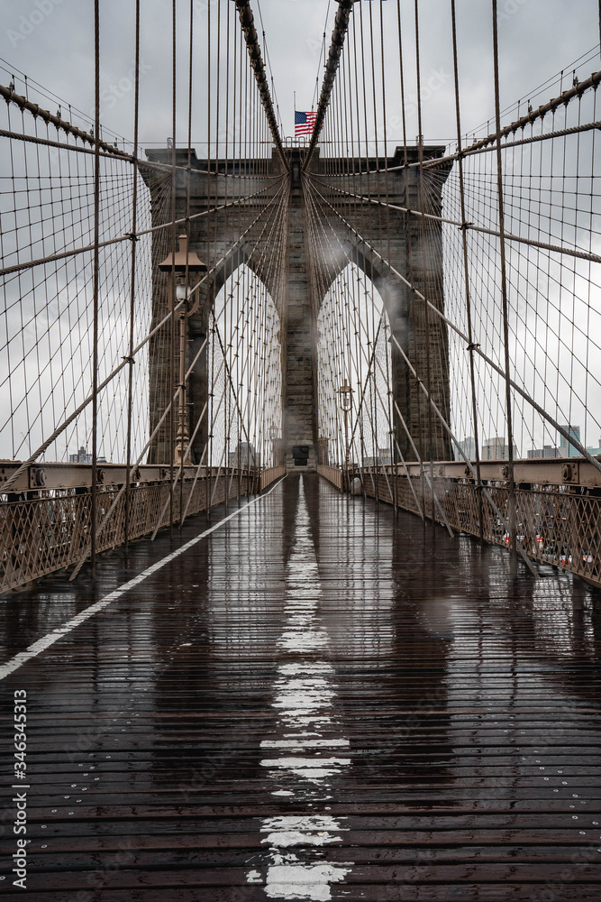 Obraz premium Brooklyn bridge. Rainy Brooklyn bridge view. Brooklyn bridge close up view. Rainy day at Brooklyn bridge. 