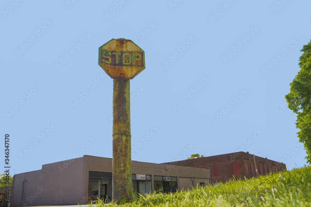 green stop sign blue background green stop sign blue background