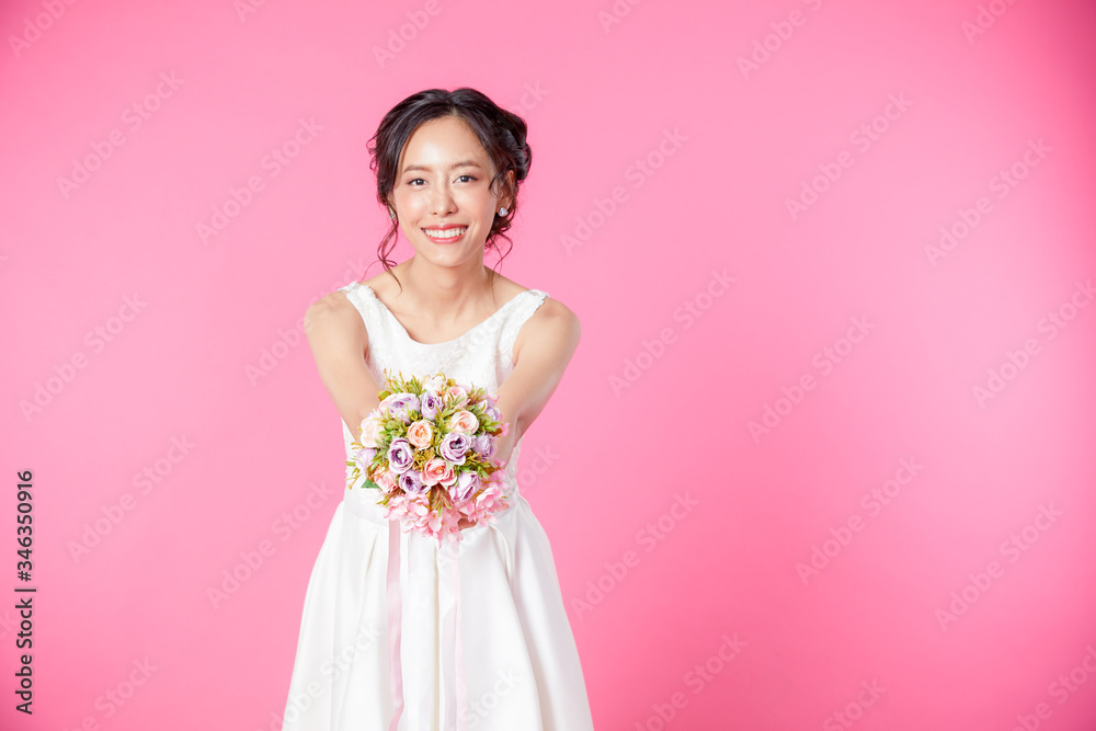 Look here, advertisement. Happy woman smiling showing look here at copy space at my text, product gesture with hand, isolated pink background. concept advertisement. Look here, advertisement. Happy woman smiling showing look here at copy space at my text, product gesture with hand, isolated pink background. concept advertisement.