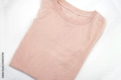 Blank folded tee shirt mock up peach color