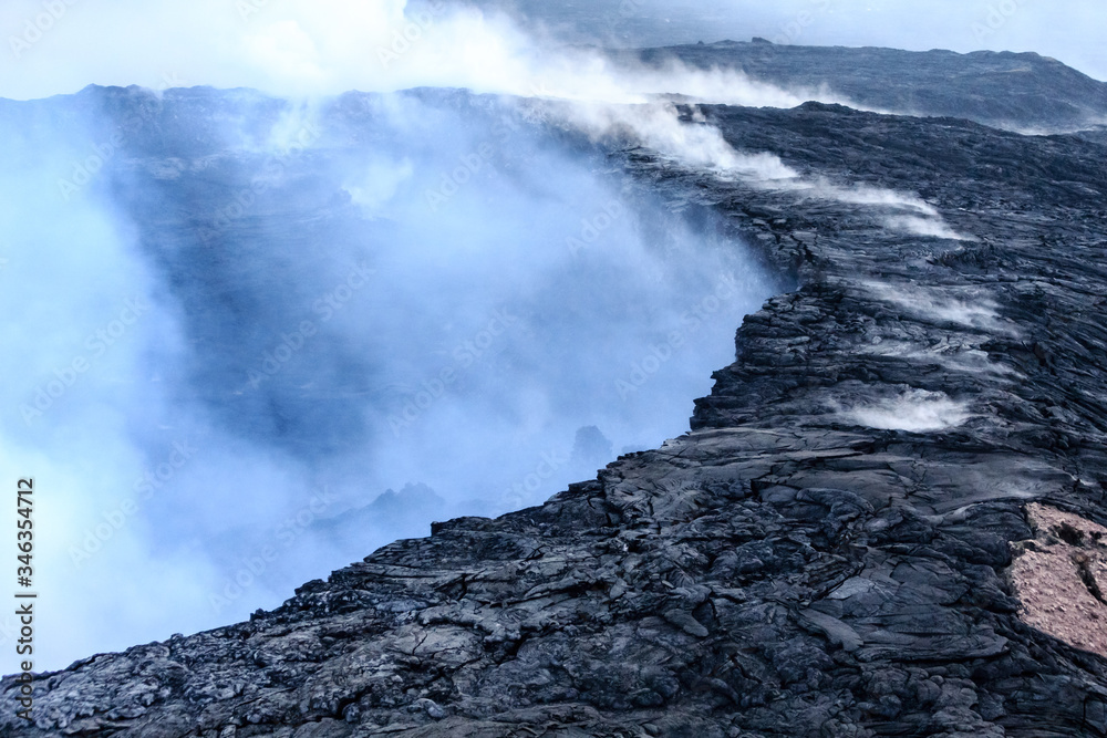 Steam, gases and sulfuric acid rise from Kilauea caldera