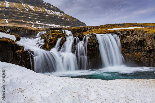 Various cascades make up Kirkjufellsfoss waterfall in Iceland