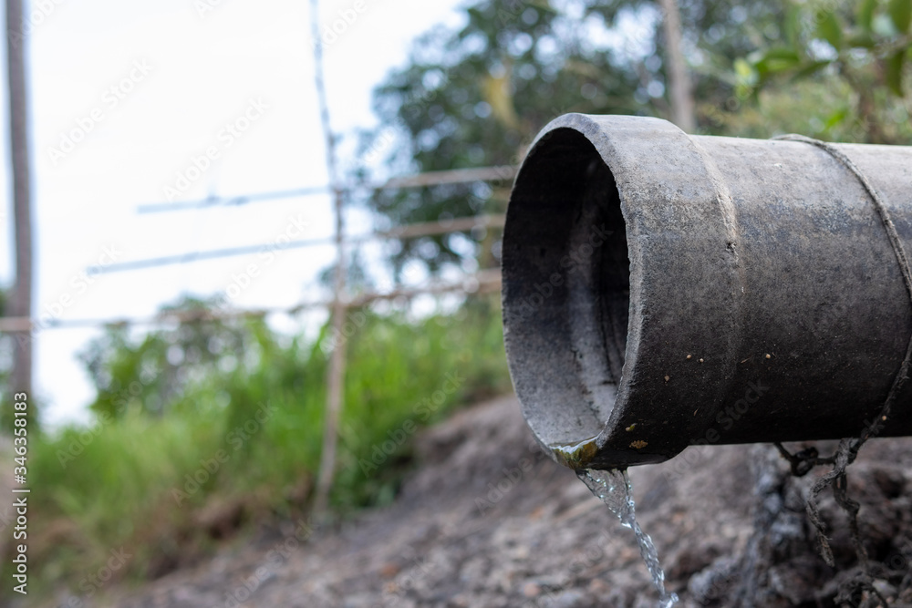 The cement drainage pipes allow waste water to flow through. Behind industrial plants After the production process The cement drainage pipes allow waste water to flow through. Behind industrial plants After the production process