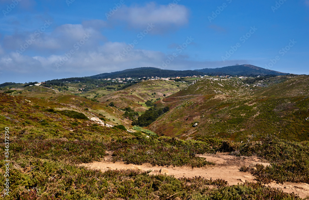 rocky landscape in the atlantic ocean. rocky cliff into the ocean portugal. rocky landscape in the atlantic ocean. rocky cliff into the ocean portugal.
