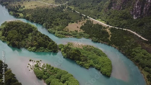 Futaleufu River, Chile. Aerial View of Magical Valley and Clear Glacial River Water Landscape, Tilt Down photo