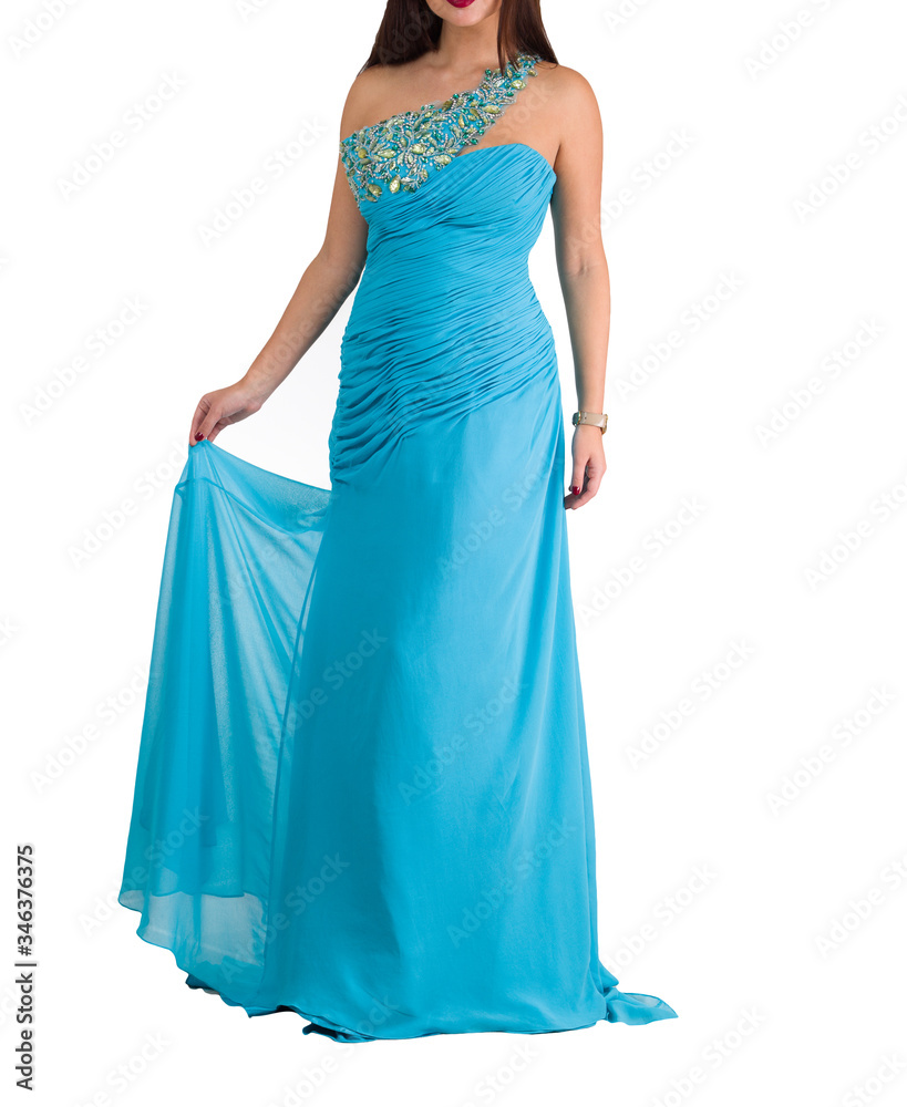 Beautiful woman dressed in evening gown over white background
