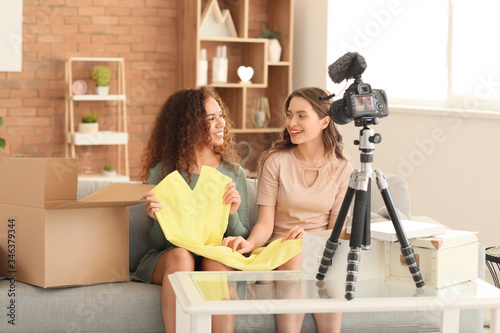 Young female bloggers recor...