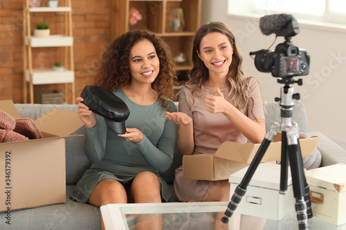 Young female bloggers recor...