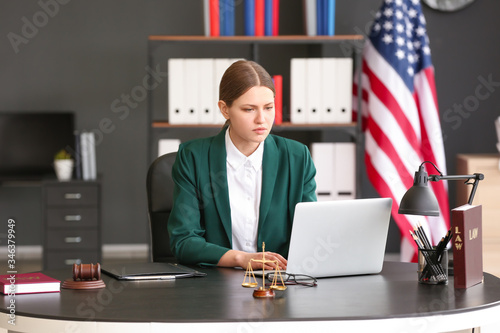 Female judge working at tab...